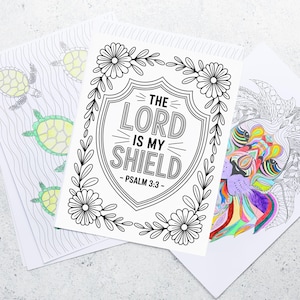 May include: Three coloring book pages. One features turtles in shades of green and gray. Another has a shield design with the text "THE LORD IS MY SHIELD - PSALM 3:3". The third page has a colorful lion design.