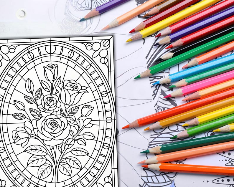 May include: A coloring book page featuring a floral design with roses and leaves, alongside a collection of colorful pencils. The pencils are arranged in a vibrant array of colors, including red, yellow, green, and blue, ready for use.