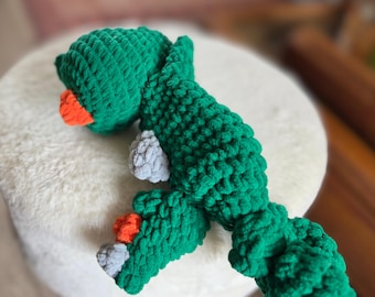 Manta de apego de dinosaurio de ganchillo, suave y acogedora, ideal para regalar en baby shower.