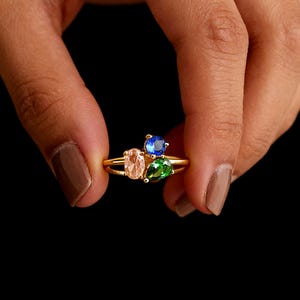 May include: A rustic wooden sign with the text "Welcome to our porch" in white lettering. The sign features a distressed finish and a simple, inviting design, perfect for outdoor decor.