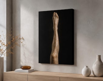 May include: A rectangular canvas wall art piece featuring a vertical, high-contrast depiction of a human leg and foot against a solid black background. The skin tone is rendered in warm, earthy brown hues with visible muscle definition.