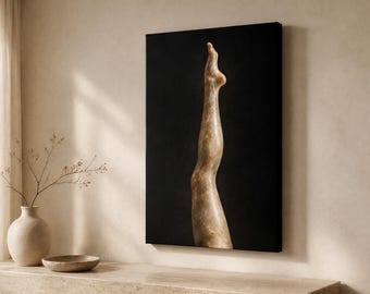 May include: A rectangular canvas wall art piece featuring a vertical, textured, bronze-toned sculpture of a human leg extended upward against a solid, deep black background. The artwork displays a smooth, metallic finish with subtle light reflections.