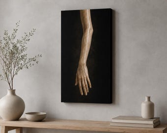 May include: A rectangular canvas wall art piece featuring a vertical depiction of a single human arm and hand rendered in a smooth, light brown tone against a solid black background. The arm is positioned straight down with fingers extended.