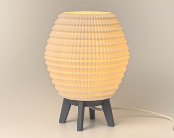 Sculpturale tafellamp – warme sfeerverlichting bij het bed voor knusse ruimtes