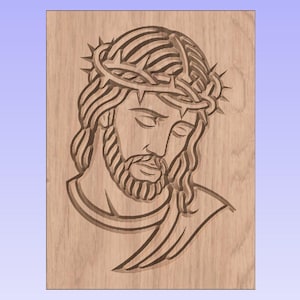 May include: A wooden carving of a man with long hair, a beard, and a crown of thorns. The carving is in a portrait style, with the man's head and shoulders visible. The wood has a natural, light brown color.