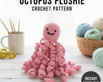 May include: A pink crocheted octopus plushie with a smiling face and curly tentacles. The text "OCTOPUS PLUSHIE CROCHET PATTERN" is displayed above the plushie. A basket of yarn and a mug with crochet hooks are in the background.