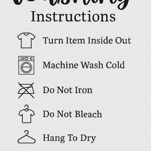 May include: White background with black text reading "Washing Instructions." Includes care symbols: turn inside out, machine wash cold, do not iron, do not bleach, and hang to dry. The text at the bottom reads "We Hope You Love It As Much As We Loved Making It. Please Handle With Care."