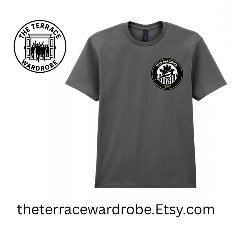 May include: A charcoal gray t-shirt featuring two circular logos. One logo reads "THE TERRACE WARDROBE" with a graphic of people in a doorway. The other logo says "THE MAGPIES 1892" with a bird graphic. The text "theterracewardrobe.Etsy.com" is at the bottom.