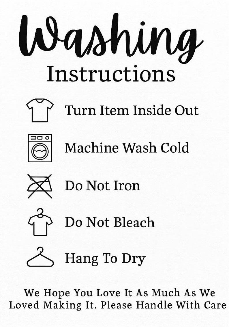 May include: White sign with black text detailing washing instructions. The text reads "Washing Instructions" followed by symbols and instructions: Turn Item Inside Out, Machine Wash Cold, Do Not Iron, Do Not Bleach, and Hang To Dry.