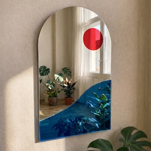 Abstrakter Sun & Wave Spiegel: Modernes Wandbild in Rot und Blau