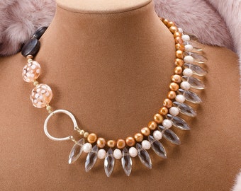Handmade Glass Lampwork Necklace - Golden Peach tones freshwater pearls, Champagne and Cream crystals contrasted with Matte Metallic Black