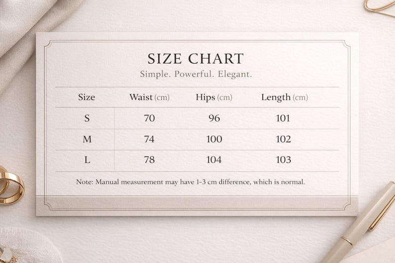 May include: A size chart on a cream-colored card with the text "SIZE CHART" and the tagline "Simple. Powerful. Elegant." The chart lists sizes S, M, and L, with waist measurements in centimeters and length measurements in centimeters.
