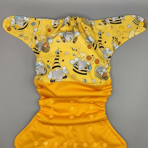Cloth diaper SassyCloth one size pocket diaper with  honey bee gnome cotton print. Ready to ship.