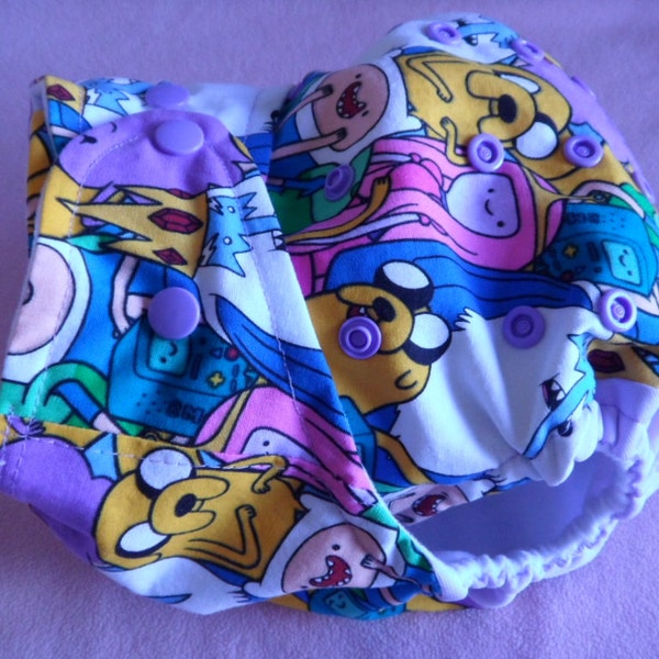 SassyCloth one size pocket diaper with Adventure time characters cotton print. Made to order.