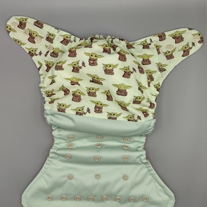 Cloth diaper SassyCloth one size pocket diaper with alien baby cotton print. Made to order.