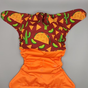 Cloth diaper SassyCloth one size pocket diaper with taco cotton print. Ready to ship.