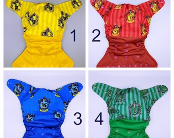 Cloth diaper SassyCloth one size pocket diaper with wizard school house print. Made to order.