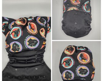 Cloth diaper SassyCloth one size pocket diaper with panther hero cotton print (1). Made to order.
