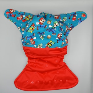 Cloth diaper SassyCloth one size pocket diaper with mario game cotton print. Made to order.