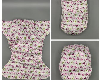 Cloth diaper SassyCloth one size pocket diaper with pink giraffes on white PUL print. Made to order.