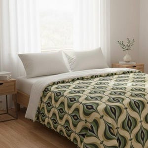 May include: A bed with white pillows and a patterned comforter. The comforter features a repeating design of green, olive, and beige teardrop shapes. The bed is in a room with white curtains and a wooden nightstand.