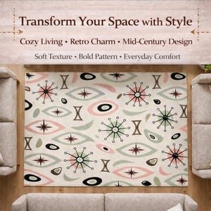 May include: A rectangular rug with a mid-century modern design. The rug features a cream background with a pattern of pink, gray, black, and brown shapes. The text "Transform Your Space with Style" is at the top.
