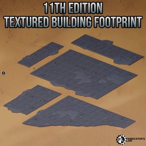 May include: A set of five grey, flat, rectangular and irregular building footprint tiles with a grid-like textured surface. The text 11TH EDITION TEXTURED BUILDING FOOTPRINT is displayed at the top, and a logo with the text FABRICATOR'S LAIR is at the bottom.