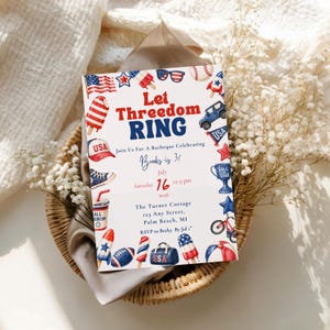 May include: A patriotic invitation with the text "Let Threedom RING" and various illustrations of American symbols. The invitation includes details for a barbecue celebrating Brooks' 31st birthday on July 16, 2026, from 12-3 pm.