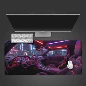 May include: A rectangular desk mat featuring a futuristic car interior design with neon lights in shades of red and purple. A white keyboard, mouse, and computer monitor are positioned above the mat. The car's dashboard and seats are visible.