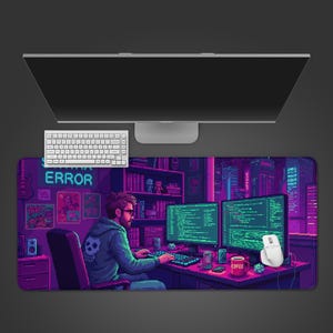 May include: A rectangular mouse mat with a pixelated design of a person coding at a desk with two monitors. The scene is lit with purple and pink hues, with the word "ERROR" in neon. A white keyboard and mouse are also visible.