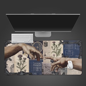 May include: A rectangular desk mat featuring a collage of vintage botanical illustrations, architectural blueprints, and the iconic 'Creation of Adam' hands. The mat includes a white keyboard and mouse, with a dark border.