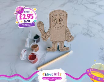 May include: A wooden figure with a smiling face and holding a spoon, with three small paint pots and a paintbrush. The figure is part of a Cosmic Kits set. The image includes the text "ONLY £2.95 EACH + POSTAGE ADDED AT CHECKOUT."