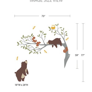 May include: A set of woodland animal wall decals featuring a brown bear, squirrels, and an owl. The decals are arranged on a branch with green leaves and yellow butterflies. The image shows the size of the decals in inches.