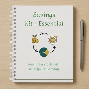 May include: A white spiral-bound notebook with the text "Savings Kit - Essential" in green. The notebook features a circular graphic with icons representing savings goals. A silver pen rests on the right side. The text "Your future starts with what you save today" is at the bottom.
