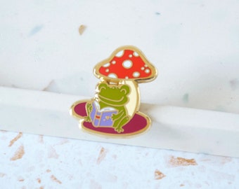 Green Frog Reading Under a Mushroom Enamel Pin, Amphibian Lapel Pin, Toad Creature Kawaii Pin