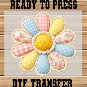 May include: A colorful flower design with a yellow center and petals in various patterns, including gingham, polka dots, and floral prints. The text "READY TO PRESS" and "DTF TRANSFER" are displayed above and below the flower.