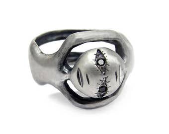 Twin ring, oxidised silver with black diamond eyes, unisex face ring