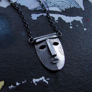 Mask pendant image 1