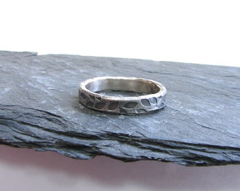 oxidised silver band textured with leaf pattern