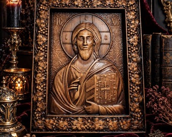 May include: A rectangular wooden wall plaque featuring a relief carving of a bearded figure with a halo, holding a book. The frame is decorated with intricate grape vine carvings. The letters IC and XC are visible on the upper sides.