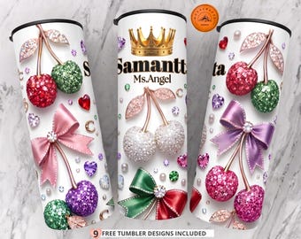 May include: Three white tumblers featuring a repeating pattern of glittery cherries in red, green, purple, and white, accented with pink, purple, and green bows, heart-shaped gems, and pearls. The center tumbler displays a gold crown and the text Samantha Ms.Angel.