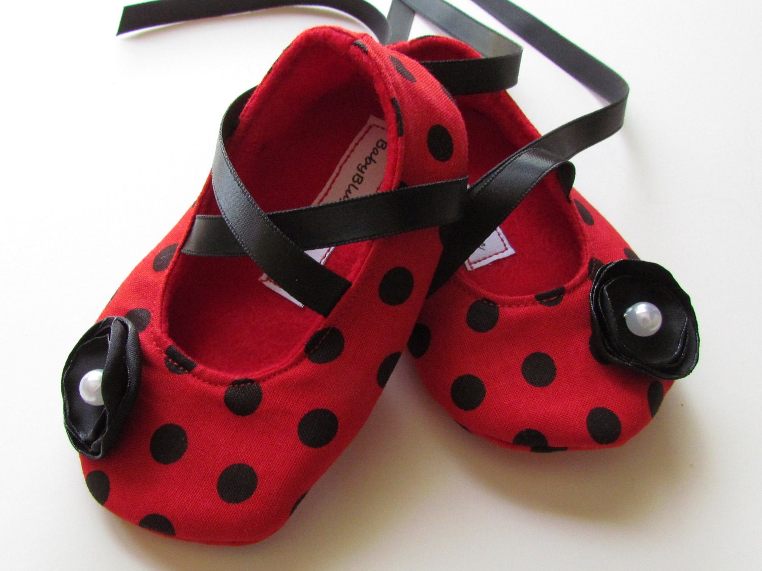 red polka dot slippers