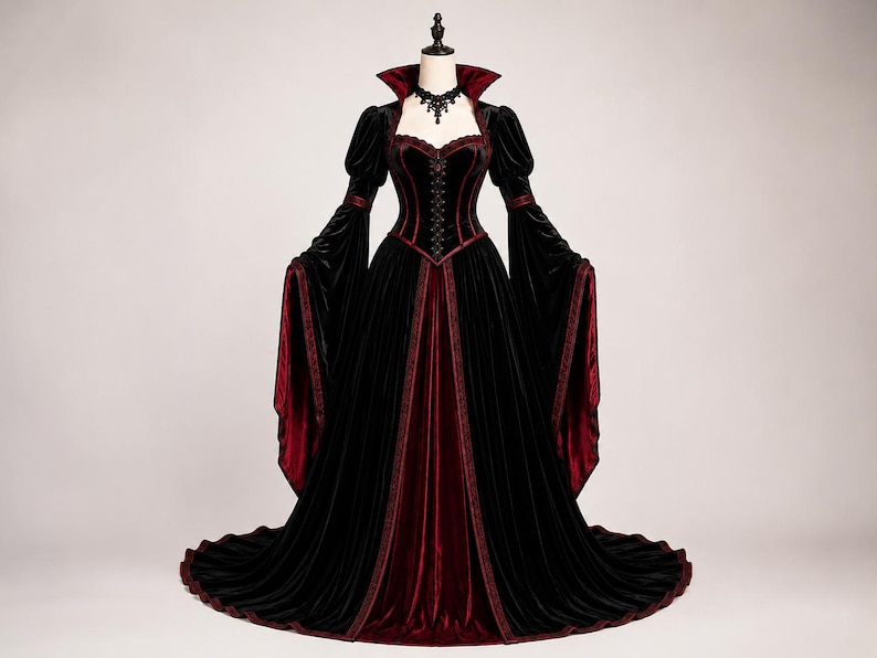 Black and burgundy Victorian vampire gown with fitted corset bodice, dramatic high collar, bell sleeves, flowing velvet skirt and long train shown from the front.