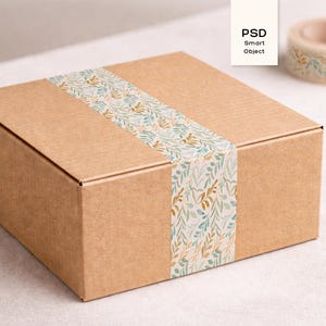 May include: A set of three ceramic mugs with a speckled, cream-colored glaze. Each mug features a different hand-painted floral design in shades of blue, green, and yellow. The mugs have a simple, rounded shape and a comfortable handle.