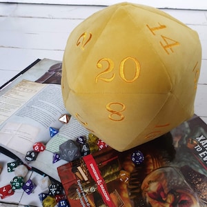Giant Plush Velvet D20 Dice. Deluxe giant dice in a daffodil yellow velvet fabric and embroidered with rich yellow coloured numbers.