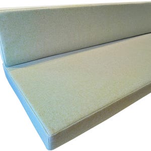 Light leaf green camper van conversion cushions with a fabric join to keep the seat cushion and the back support cushion in place while the van is moving. Thick firm upholstery foam van mattress cushions with memory foam toppers for extra comfort when sleeping. Soft, wool like cushion covers which are machine washable and stain resistant for hard wearing, pet friendly mattress cushion covers. Made to measure for a perfect fit for your campervan renovation. Pull out bed cushions bespoke.