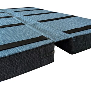 A set of joined camper van cushions for a bench seating area that pulls out to a sleeping pad. Velcro strips on the back of the cushions keep them in place, easy to move. Thick, firm, supportive foam for a good nights sleep. Memory foam, medium density foam or reflex foam inners. Made to measure camper van conversion cushions in luxury fabrics, machine washable, easy care, pet and dog friendly fabrics. Long zips to easily remove the covers on the motor home cushions. Large camper van cushions