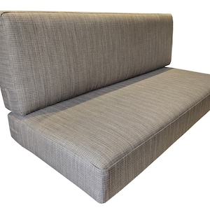 A seat and back cushion set for a wooden sofa bench area. Thick, comfy medium density upholstery foam inside with dacron for a plump finished cushion. Mid century modern chair cushions made to measure. MCM sofa. Greige colour seating cushions made to measure. Machine washable sofa cushion covers for replacement sofa cushions. Chesterfield sofa cushions in faux leather, wool plaid and tartan fabrics. Tweed fabric sofa seat cushions and back cushions. Sofa cushion cover with zip. Indoor seating