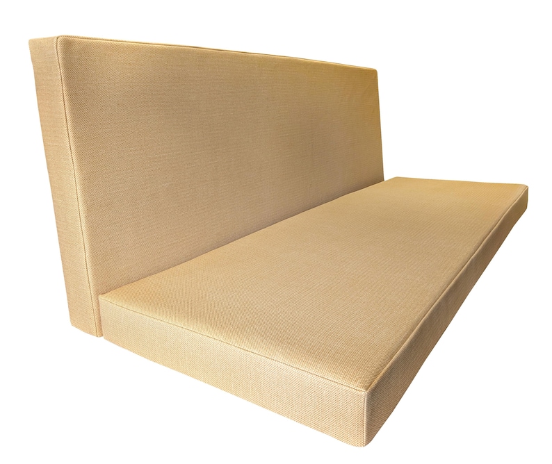 A seat cushion and back cushion made to measure for a camper van renovation. Both van cushions have thick, comfortable foam inside, a firm foam base with memory foam on top. The bench cushion covers pull out to form van mattress cushions for plywood camper bed set. Wipe clean yellow PVC fabric camper van cushion covers with no piping at the edges and big long zips to get the covers on the foam easily. Bespoke, luxury cushions for motor homes and campervan bed sets. Any shape, cut outs to fit