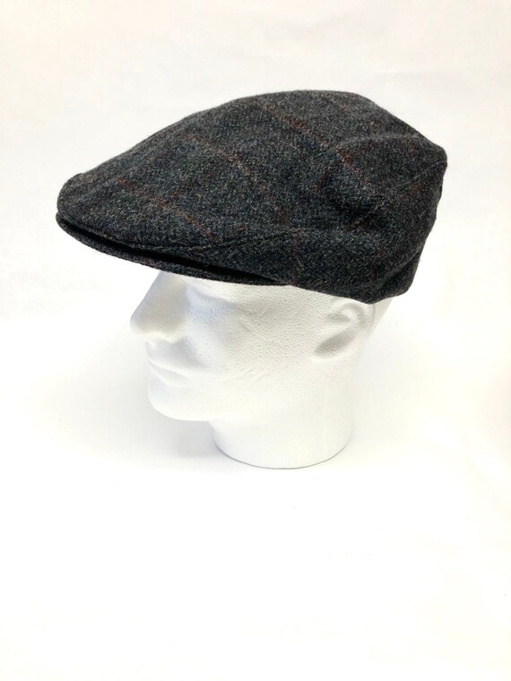 Gray golf cap driving Gem